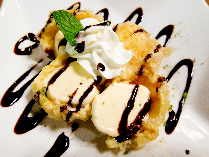 Zen019.jpg - Tempura Vanilla Ice Cream Hot and crispy, double shelled, smooth and creamy vanilla flavoured tempura ice cream. Topped with whipped cream and Matcha Power & Chocolate sauce. 